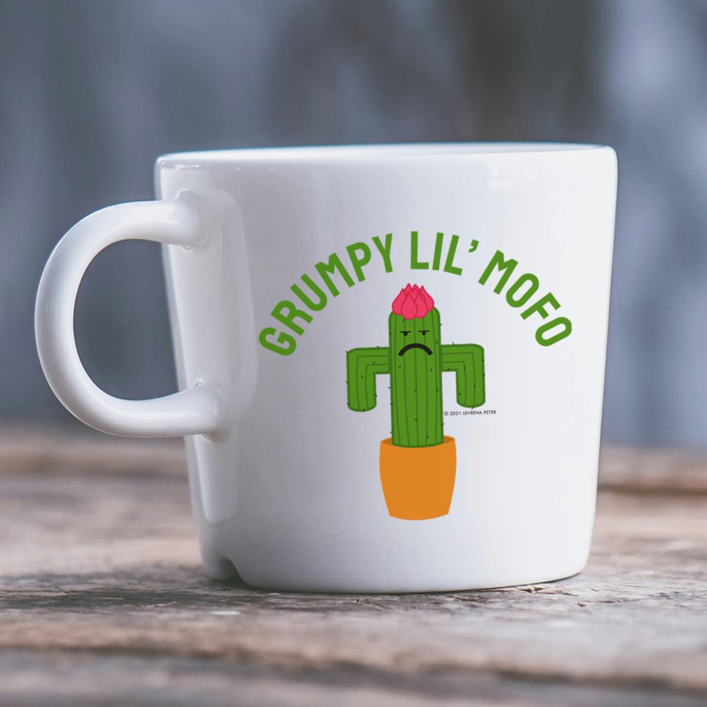 Grumpy Lil Mofo illustrated mug on a surface